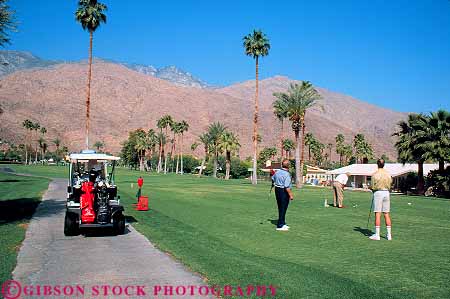 Stock Photo #12720: keywords - california cart carts desert destination friend friends golf golfer golfers golfing golfs group groups horz leisure man men outdoor outside palm people play player players playing plays recreation relax relaxes relaxing resort resorts season sport spring springs summer travel vacation