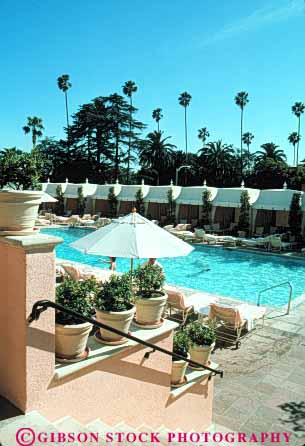 Stock Photo #8380: keywords -  angeles beverly california exclusive hills hotel hotels los pool pools resort resorts scale swim swimming umbrella umbrellas up vacation vert