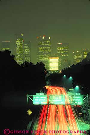 Stock Photo #7800: keywords -  air america american angeles architecture building buildings business california center cities city cityscape cityscapes dark downtown dusk evening haze high highway lighting lights los modern new night office pollution rise skyline skylines smog urban usa vert