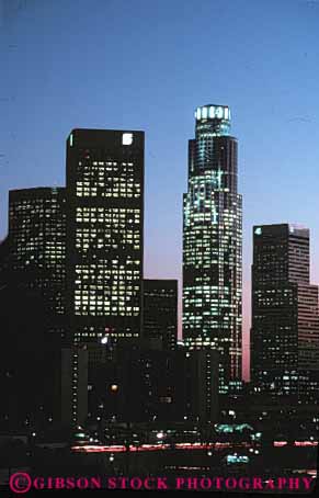 Stock Photo #7811: keywords -  america american angeles architecture building buildings business california center cities city cityscape cityscapes dark downtown dusk evening high lights los modern new office reflection rise skyline skylines urban usa vert