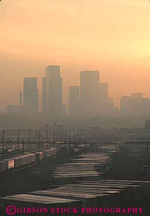 Stock Photo #8494: keywords -  air angeles atmosphere build buildings california center cities city cityscape cityscapes contaminant contaminate contaminated contaminates core dirty downtown environment environmental fog los particle particles pollute pollutes polluting pollution sick sicken sickening sickens skyline skylines smog smoke smoky unhealthy urban vert weather