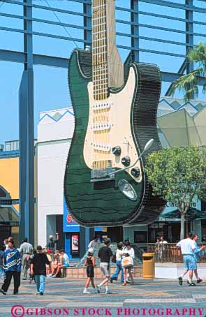 Stock Photo #8514: keywords -  advertisement advertising angeles attraction big business california citywalk destination entertainment giant guitar hollywood huge instrument large los mall malls musical oversize oversized plaza plazas retail shop shoppers shopping shops sign signs store stores string studios summer tourist tourists travel traveler travelers universal usa vert