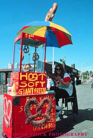 Stock Photo #9827: keywords - beach beaches booth business california cart coast coastal monica pier pretzel santa seashore shore shoreline small stand umbrella vendor vendors vert