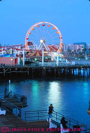 Stock Photo #9830: keywords - amusement beach beaches california coast coastal dark dusk evening ferris light lighting monica night ocean park parks pier piers sand sandy santa sea seashore shore shoreline sunset surf vert water wheel wheels