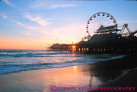 Stock Photo #9831: keywords - beach beaches california coast coastal dark dusk evening ferris horz monica night ocean pier piers round sand sandy santa sea seashore shore shoreline sunset sunsets surf water wheel wheels