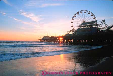 Stock Photo #9831: keywords -  beach beaches california coast coastal dark dusk evening ferris horz monica night ocean pier piers round sand sandy santa sea seashore shore shoreline sunset sunsets surf water wheel wheels