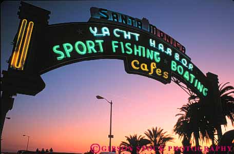 Stock Photo #9835: keywords -  arch arches beach beaches bright california coast coastal dark dusk evening harbor horz illuminate illuminated lighting lights monica neon night ocean sand sandy santa sea seashore shore shoreline sign signs sunset surf water