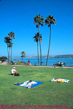 Stock Photo #9486: keywords -  california coast coastal destination diego grass green jolla la lawn ocean resort resorts san sea seashore shore shoreline summer sunbathers surf travel vert water