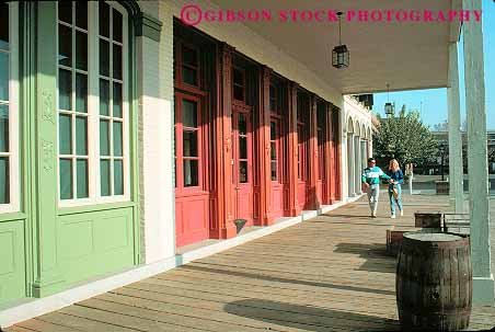 Stock Photo #11377: keywords - american attraction boardwalk building buildings california cities city couple historic history horz old sacramento site tourist walking west western