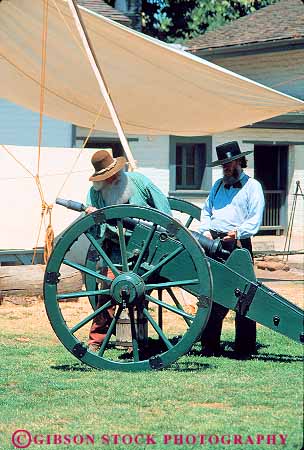 Stock Photo #11384: keywords -  american california cannon cannons cities city costume costumed era fort forts ft ft. historic history living man men prepare reenact reenacting reenactment reenacts sacramento site sutters vert west western