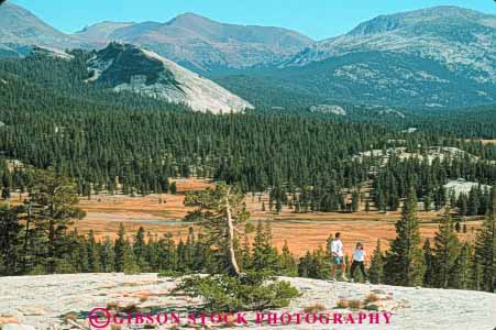 Stock Photo #9940: keywords -  adventure alpine california couple environment explore hike hiker hikers hiking horz in landscape man meadows mountain mountains mt mtn mtns national nature park parks people recreation scenery scenic sierra summer toulumne walk walker walkers walking wild wilderness woman yosemite