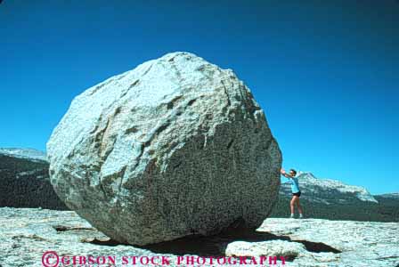 Stock Photo #9948: keywords -  alpine ball big boulder california contrast contrasting cut difference different environment erratic futile geologic geological geology glacial glacier glaciers granite hard heavy horz huge impossible landscape large man mountain mountains mt mtn mtns national nature park parks pushes released resist resistance roll rolling round scenery scenic scour sierra size summer valley valleys wild wilderness yosemite