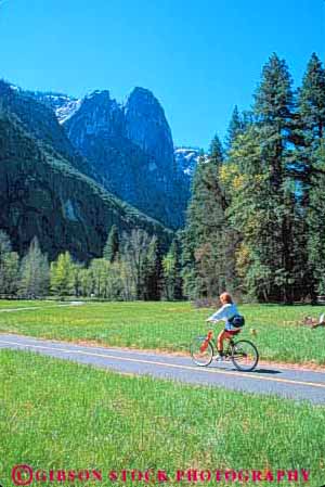 Stock Photo #9957: keywords -  alpine bicycling bike california cliff cliffs cut environment forest forests geologic geological geology glacial glacier glaciers granite in landscape mountain mountains mt mtn mtns national nature park parks path peddle peddles peddling recreation route scenery scenic scour sierra sport summer trail tree trees valley valleys vert wild wilderness woman yosemite