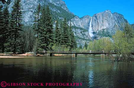 Stock Photo #9966: keywords -  alpine bridges california cliff cliffs cut environment falls footbridge forest forests geologic geological geology glacial glacier glaciers granite horz landscape merced mountain mountains mt mtn mtns national nature near over park parks people river rivers scenery scenic scour sierra summer tree trees valley valleys waterfall waterfalls wild wilderness yosemite