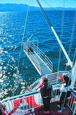 Stock Photo #9571: keywords -  alpine boat boats bow california clean clear destination freshwater lake lakes mountains of people queen sierra summer tahoe tour tours travel vert water