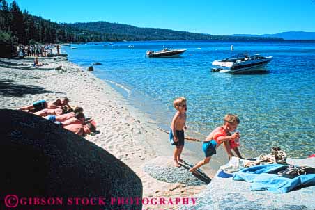 Stock Photo #9592: keywords -  alpine beach beaches bliss boy boys brother brothers california child children clean clear destination freshwater friend friends horz lake lakes mountains park play sierra state summer sunny sunshine tahoe travel warm water
