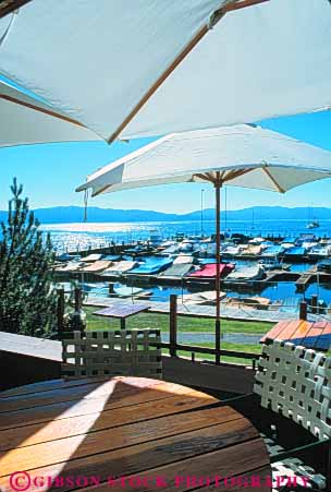 Stock Photo #9595: keywords - alpine california city clean clear deck destination freshwater harbor lake lakes marina marinas mountains shade sierra summer tahoe travel umbrella umbrellas vert water yacht