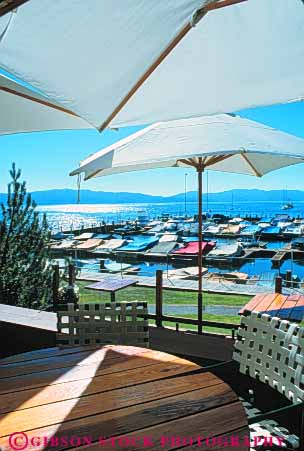 Stock Photo #9595: keywords -  alpine california city clean clear deck destination freshwater harbor lake lakes marina marinas mountains shade sierra summer tahoe travel umbrella umbrellas vert water yacht