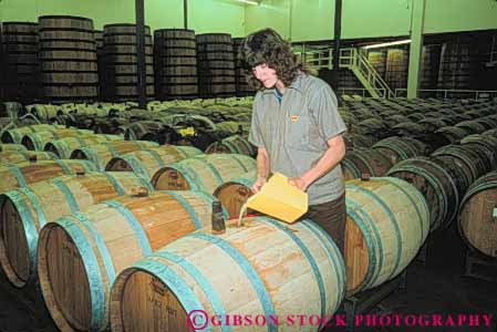 Stock Photo #10034: keywords -  adjusts attraction barrel barrels california employee horz interior interiors job jobs making mondavi napa occupation tourist valley wine wineries winery wines woman work worker workers working
