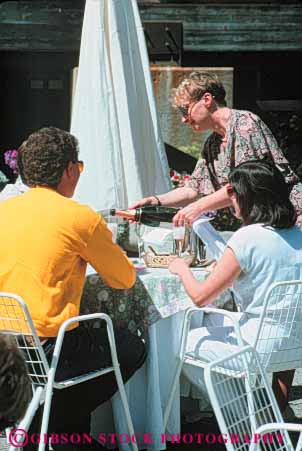 Stock Photo #10059: keywords -  cafe cafes california chandon domaine host hostess napa outdoor outside quests restaurant restaurants room sample serve server serving taste tasting valley vert wine wineries winery wines with