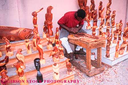Stock Photo #10213: keywords - bahamas caribbean carve carving craft crafts craftsman craftsmen destination destinations horz market nassau resort resorts sculpture skill straw sunny sunshine travel tropic tropical tropics vacation warm wood