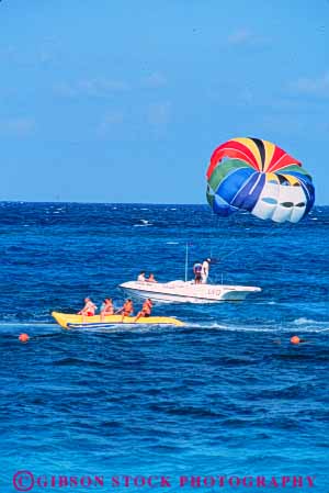 Stock Photo #10249: keywords -  atlantis bahamas caribbean destination destinations float floating floats fun island islands nassau ocean paradise parasail people play playing recreation resort resorts sea sunny sunshine toy toys travel tropic tropical vacation vert warm water
