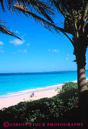 Stock Photo #10253: keywords -  atlantis bahamas beach beaches caribbean coast couple destination destinations island islands isolated lone nassau ocean paradise people privacy private resort resorts sand sandy sea secluded shore solitary solitude sunny sunshine travel tropic tropical vacation vert warm
