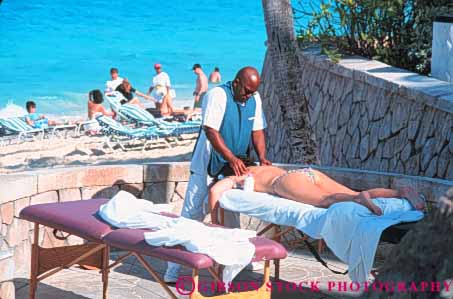 Stock Photo #10254: keywords - atlantis bahamas black caribbean destination destinations ethnic gets heal healing horz island islands job jobs man massage massages massaging minority mossier nassau ocean paradise relax relaxes relaxing resort resorts sea sooth soothes soothing sunny sunshine touch touching travel tropic tropical vacation warm woman work worker working works