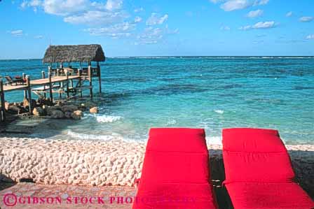 Stock Photo #10262: keywords -  and bahamas caribbean chairs color colorful compass destination destinations dock docks furniture horz islands nassau ocean point red resort resorts sea sunny sunshine travel tropic tropical vacation warm