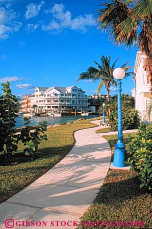 Stock Photo #10269: keywords -  apartment apartments bahamas building canal caribbean community condo condominium condominiums condos destination destinations island islands modern nassau new point residential resorts sandy sidewalk sunny sunshine townhouses travel tropic tropical vacation vert warm waterfront