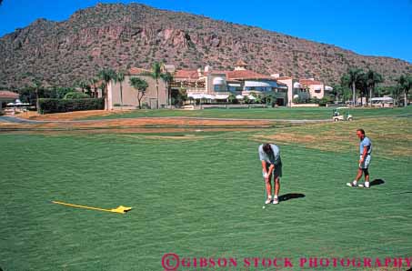 Stock Photo #9071: keywords -  arid arizona climate community desert destination dry golf golfers golfing horz hot men phoenician phoenix putt putting putts resort resorts scottsdale southwest southwestern sunny travel vacation warm west western