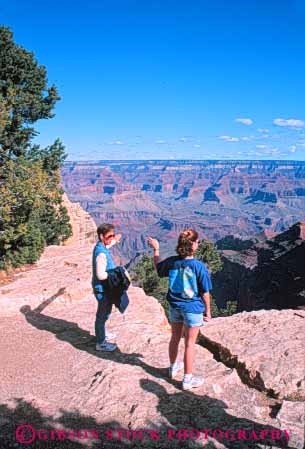 Stock Photo #10119: keywords - arizona canyon canyons colorado earth erode eroded eroding erosion famous geologic geological geology grand landmark landmarks national park parks people rim river rock science south southwest strata tourist tourists vert west western women
