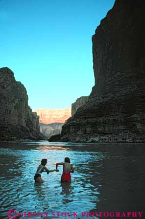 Stock Photo #10133: keywords -  arizona canyon canyons colorado famous grand into landmark landmarks national park parks river silhouette silhouettes southwest vert wade west western woman