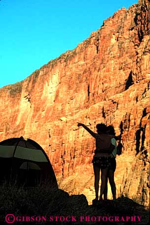 Stock Photo #10135: keywords -  affection affectionate arizona canyon canyons colorado couple embrace famous grand hug hugging intimate landmark landmarks love lovers loving man national park parks released river romantic share silhouette silhouettes southwest together vert west western woman