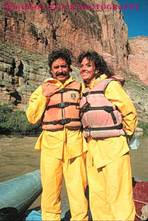 Stock Photo #10136: keywords -  arizona canyon canyons colorado couple famous full gear grand landmark landmarks national outfit park parks protect protection raft rain released river southwest suit vert weatherproof west western yellow