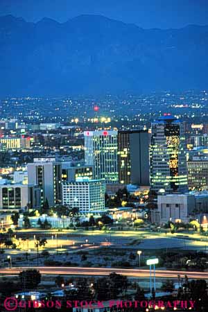 Stock Photo #7495: keywords - america american architecture arizona building buildings business center cities city cityscape cityscapes dark downtown dusk evening light lighting lights modern new night nite office skyline skylines southwest tucson urban usa vert west