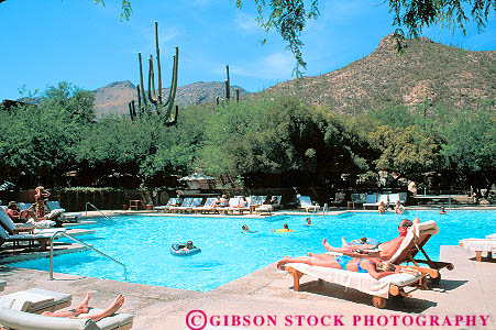 Stock Photo #11684: keywords - arizona canyon children desert deserts destination families family horz lowes outdoor outside people pool pools relax relaxing resort resorts southwest sunbath sunbathing sunny sunshine swim swimming travel tucson vacation ventana water west western