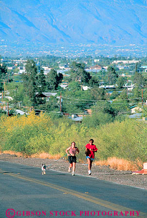 Stock Photo #11686: keywords -  arizona conditioning desert exercise exertion fitness jog jogger joggers jogging physical run runner runners running runs southwest street training tucson uphill vert west western woman women workout