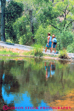 Stock Photo #11690: keywords - arizona canyon couple desert hike hikers hiking man people recreation sabino southwest summer tucson vert walk walker walkers walking west western woman