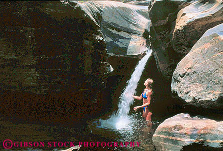 Stock Photo #11693: keywords - arizona canyon cool cooling desert horz in recreation refresh refreshing released river rivers sabino southwest splash splashing stand standing stream streams summer swim swimming swims tucson waterfall waterfalls west western wet woman young