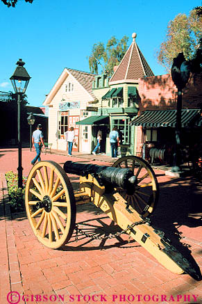 Stock Photo #11695: keywords - arizona cannon cannons dust mall malls shoppers shopping shops southwest store stores theme themed town trail tucson vert west western