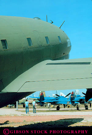 Stock Photo #11696: keywords - air aircraft airplane airplanes arizona bomber bombers equipment ii jet jets men museum museums outdoor outside pima plane planes preserve preserved southwest through tucson two vert vintage walking war west western world
