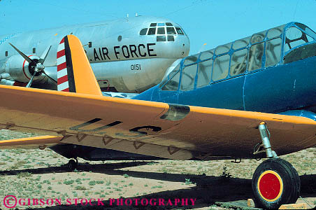 Stock Photo #11697: keywords -  air aircraft airplane airplanes arizona bomber bombers equipment horz ii jet jets men museum museums outdoor outside pima plane planes preserve preserved southwest through tucson two vintage walking war west western world