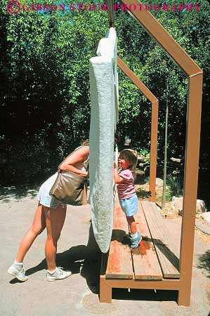 Stock Photo #11707: keywords - arizona boy child children deserts game games girl mother parent peekaboo single southwest tucson vert west western zoo zoos