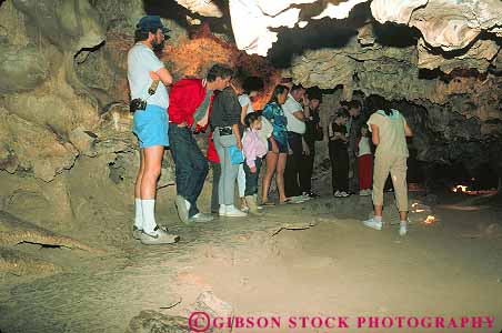 Stock Photo #11715: keywords - arizona cave cavern caverns caves colossal explore explores exploring families family geologic geological geology group groups horz people rock southwest tour tourist tourists tours tucson west western
