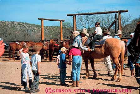 Stock Photo #12735: keywords -  adventure arizona child children class cowboy dude family group guest guests horse horseback horz inn kid kids learn outdoor outside people ranch ranches resort resorts ride rider riders riding southwest teach vacation vacationing vacations west western wickenburg