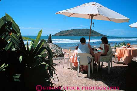Stock Photo #12820: keywords -  beach cafe cafes cid coast coastal country couple couples destination dine dining eat eating el foreign horz hotel mazatlan mexico patio relax relaxes relaxing resort resorts travel tropical umbrella vacation vacations warm