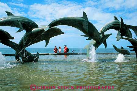 Stock Photo #12821: keywords - animal animals coast coastal continues country destination foreign fountain fountains horz jump jumping life mammal marine mazatlan metal mexico porpoise porpoises resort resorts sculpture sculptures travel tropical vacation vacations