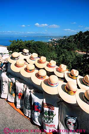 Stock Photo #12828: keywords -  and coast coastal country destination for foreign hat hats mexico puerto resort resorts sale sell selling shirts tee travel tropical vacation vacations vallarta vendor vert