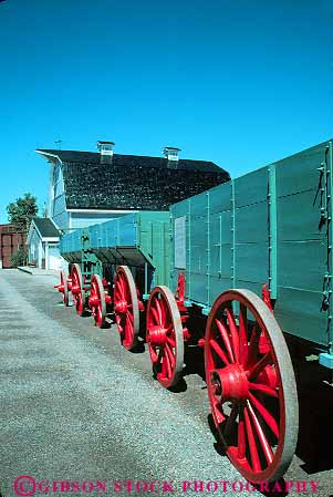 Stock Photo #12112: keywords -  alberta and barn barns buildings calgary canada cultural culture farm farms heritage historic history living museum museums oval park parks public red round rural vert wagon wagons wheel wheels wood wooden